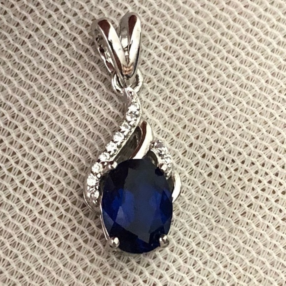 9.25 Sterling Silver Blue Pendant